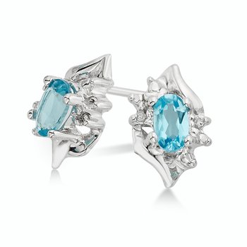 White gold, oval Swiss Blue Topaz and diamond stud earrings