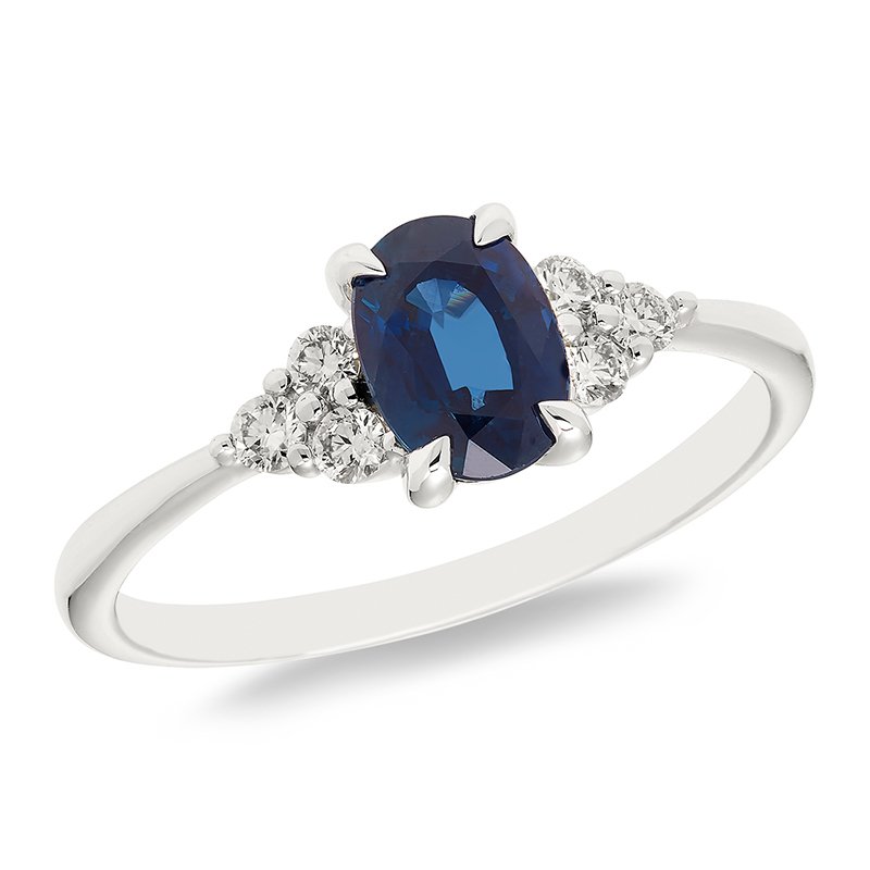 White gold, oval genuine sapphire and diamond ring