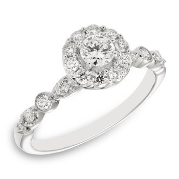 White gold and diamond halo engagement ring