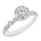 White gold and diamond halo engagement