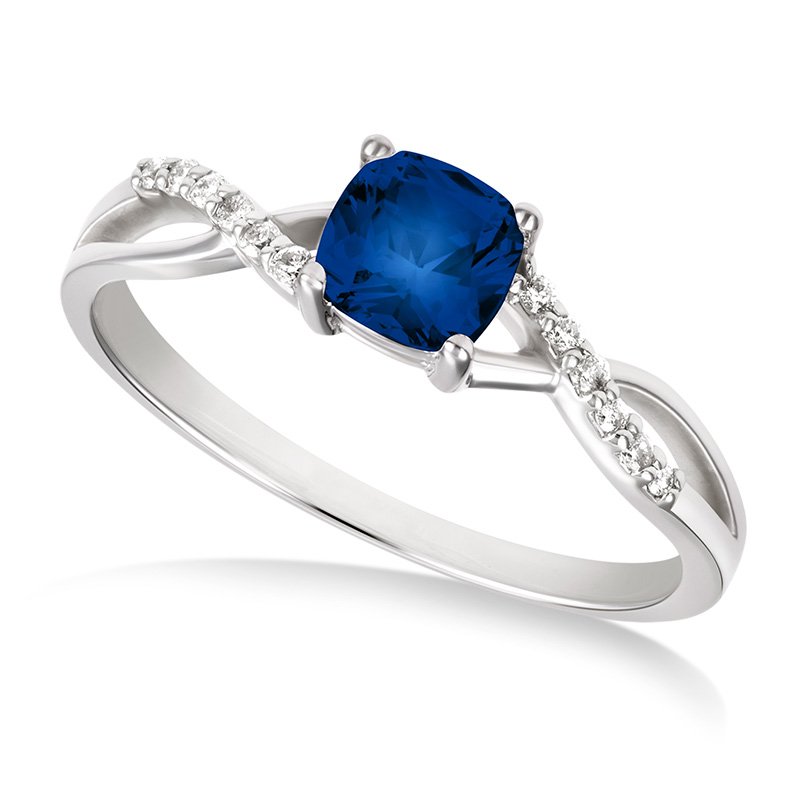 White gold, cushion-cut created sapphire and diamond ring with split shank