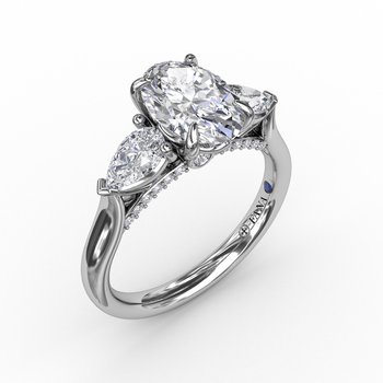 Classic Three-Stone Oval Engagement Ring With Pear-Shape Side Stones