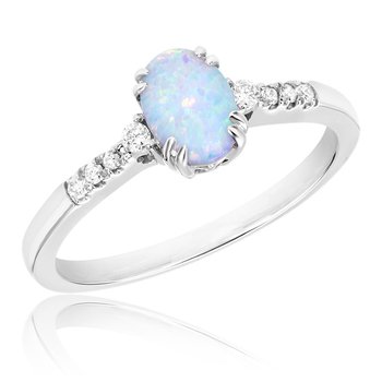 White gold, oval created opal and diamond fashion ring