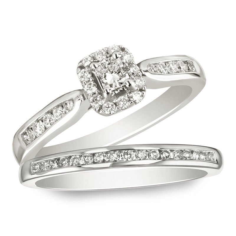 White gold, radiant-cut and round diamond halo bridal set