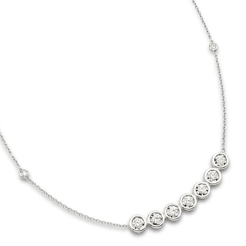 White gold diamond necklace with accent diamonds on chain