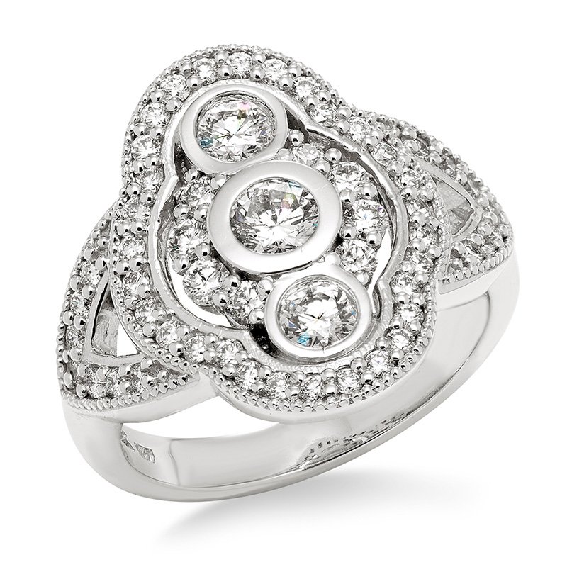 White gold, vintage-inspired diamond halo ring with three bezel-set stones