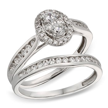 White gold, oval-shape diamond cluster halo bridal set