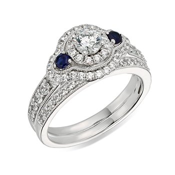 White gold, round diamond halo and sapphire engagement ring