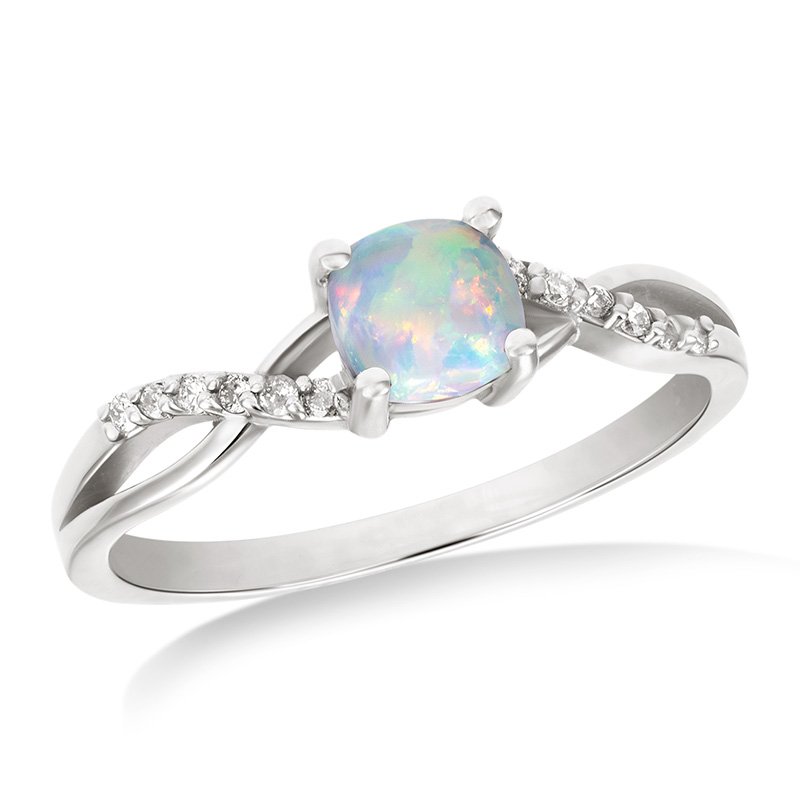 White gold, cushion-cut created opal and diamond ring with split shank