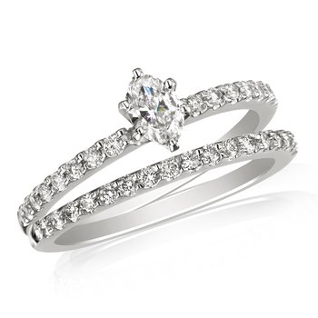 White gold and oval diamond solitaire bridal set