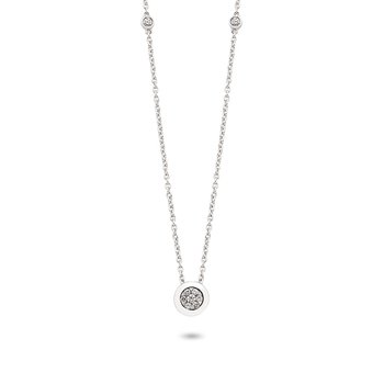 White gold and round diamond solitaire illusion necklace with accent diamonds on chain