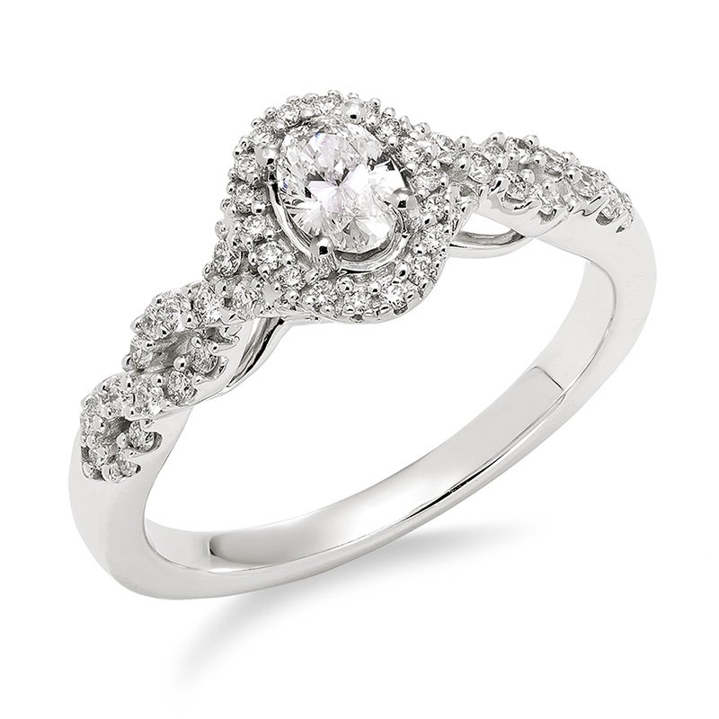 White gold and diamond oval halo engagement ring