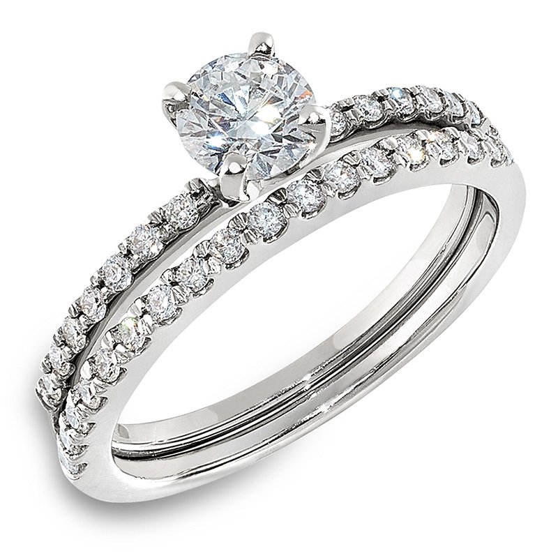 White gold, round diamond solitaire ring with straight diamonds on shank