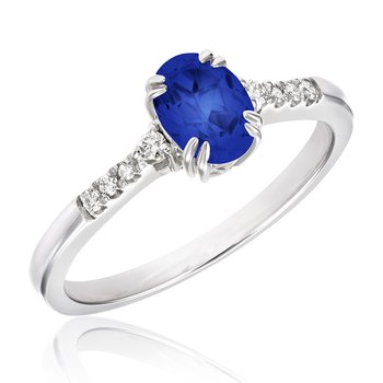White gold, oval created sapphire and diamond fashion ring