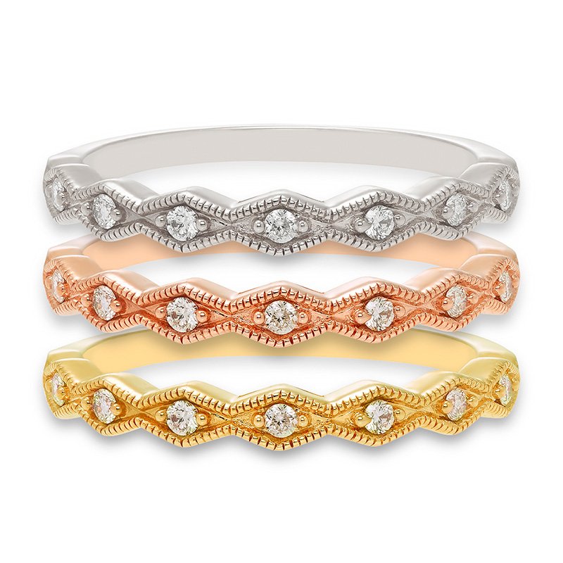 Gold bands with a diamond-shaped pattern and round diamonds