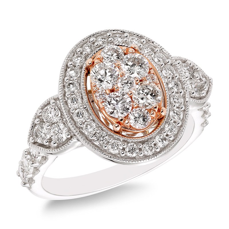 Two-tone gold, vintage-inspired oval diamond halo ring